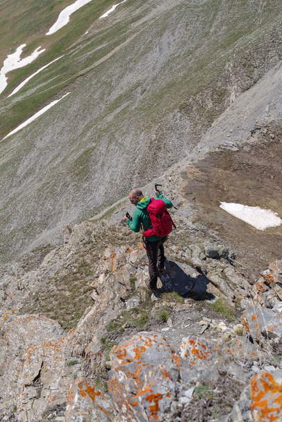Mountain hiker standing on peak, Cottian Alps, Italy - Foto, Imagem