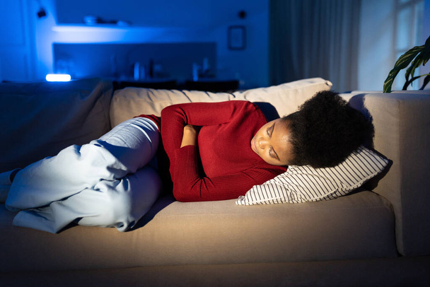 Stressful woman lying on couch suffer from relationship crisis, fight with boyfriend or heartbreak - Fotoğraf, Görsel