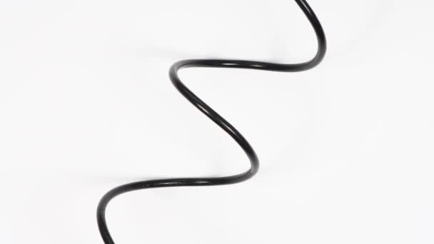 Black wire isolated on white. Top view. Loop motion. Rotation 360. 4K UHD video footage 3840X2160. - Footage, Video