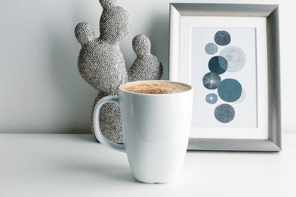 Hot coffee cappuccino in ceramic cup isolated on white background, clipping path included. cappuccino with spices and cinnamon. Cozy morning concept. Hygge. - Φωτογραφία, εικόνα