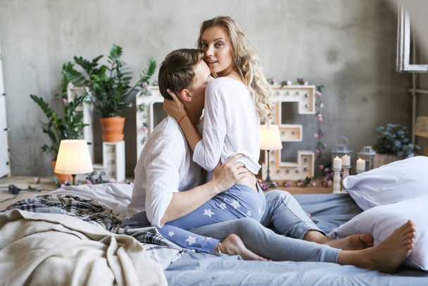 Lifestyle. Lovely couple at home - Фото, изображение