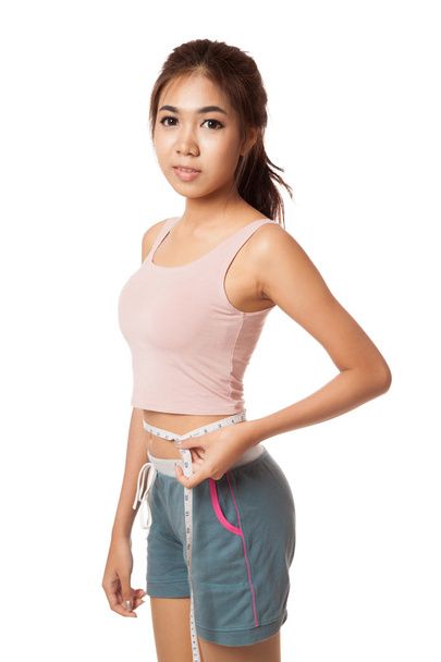 Asian slim girl with measuring tape - Zdjęcie, obraz