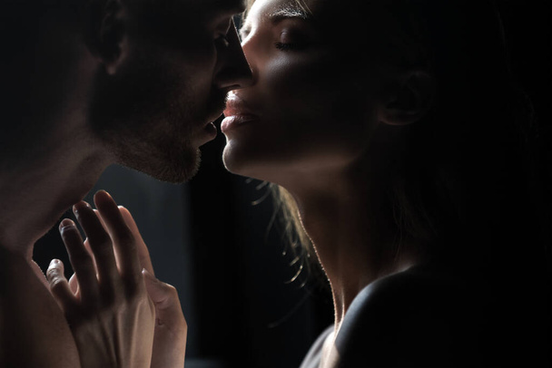 Close up face of a beautiful young couple in love embracing, romance and and affection. Sensual couple kiss. I love you. Romantic and love. - Fotografie, Obrázek