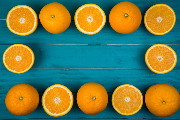 Fresh organic oranges on wooden background - Photo, Image