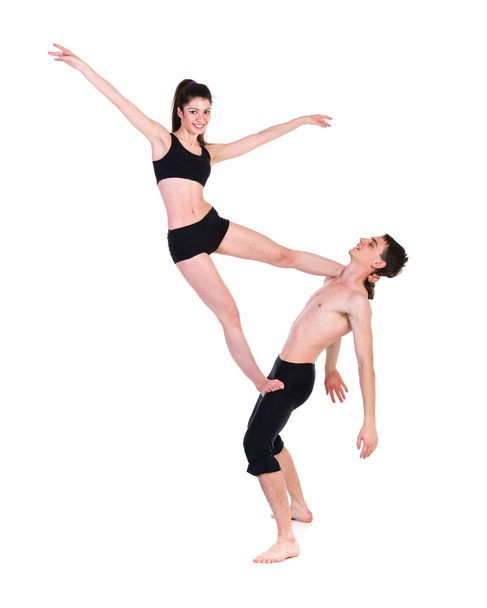 couple man and woman exercising fitness dancing on white background - Foto, Imagen