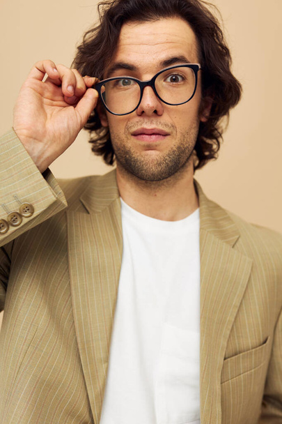 handsome man in a suit posing emotions wear glasses isolated background - Foto, Imagen