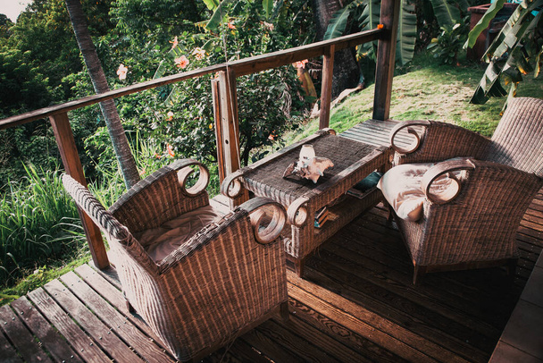 beautiful terrace with wooden chairs in the jungle - Photo, Image
