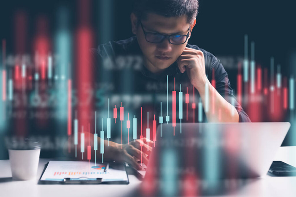 Businessman working in office, technical price chart and red and green candlestick chart indicator and computer screen background for stock trading, double exposure Traders analyze data. - Photo, Image