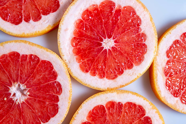 sliced pieces of grapefruit. Close-up. - Фото, зображення