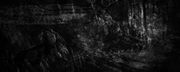 cemento de hormigón negro fondo desenfocado con grietas grises oscuras y arrugas arrugadas - Foto, Imagen