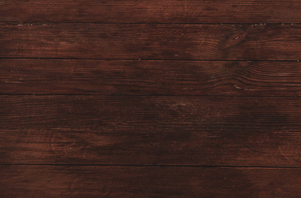 Винтажная текстура коричневого дерева с ножницами и отверстиями для ногтей. Старая деревянная стена. Деревянные темные горизонтальные доски - Фото, изображение