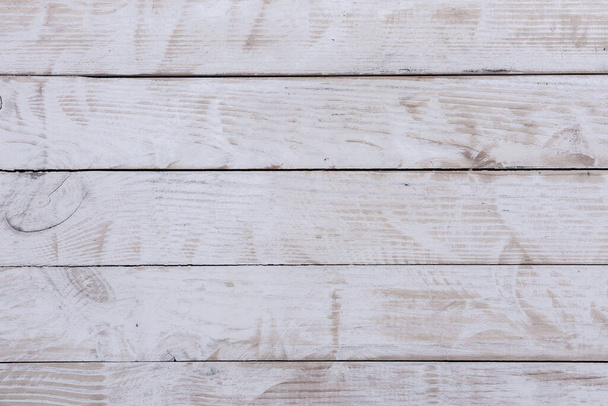 Struttura di fondo in legno bianco vintage con nodi e fori per unghie. Vecchio muro di legno dipinto. - Foto, immagini