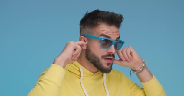 attractive casual man covering his ears and feeling annoyed - Materiaali, video