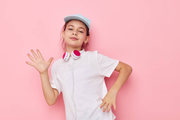 cute girl wearing headphones posing emotions childhood unaltered - Фото, изображение