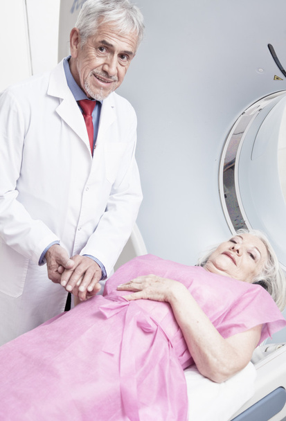 Doctor reassuring female patient - Photo, Image