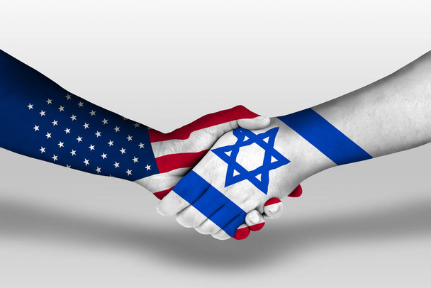 Handshake between israel and united states of america flags painted on hands, illustration with clipping path. - Photo, image