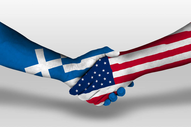 Handshake between united states of america and greece flags painted on hands, illustration with clipping path. - Photo, Image
