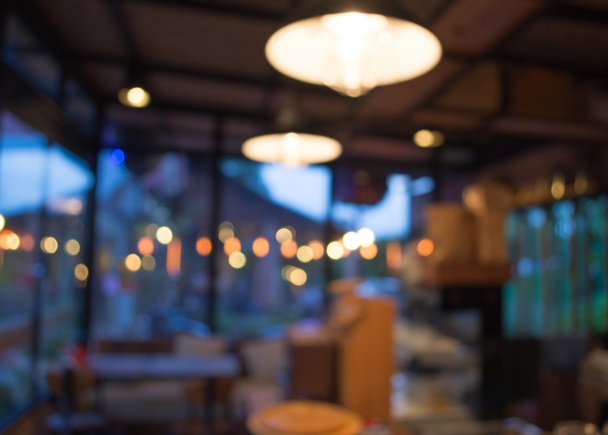 Coffee shop blur background with bokeh image. - Photo, Image