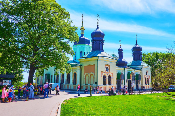 KYIV, UKRAINE - MAY 16, 2021: The Trinity Cathedral of St Jonas Trinity Monastery, located in Hryshko Botanical Garden, on May 16 in Kyiv, Ukraine - Photo, Image