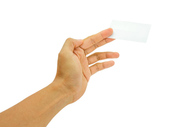 Women hand holding blank paper business card isolated on white background - Fotó, kép