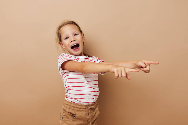 cheerful girl posing childhood fashion isolated background - Photo, image