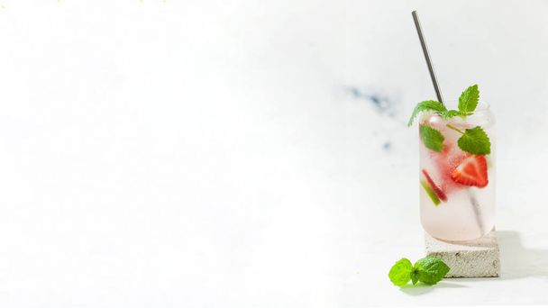  Cooling lemonade banner with strawberries and mint in a glass. Copy space. - Fotó, kép