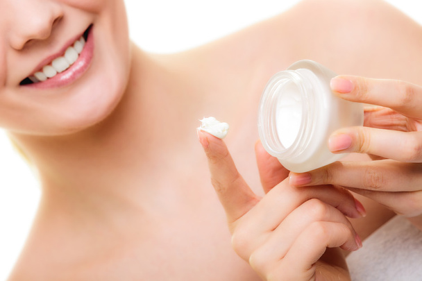 Girl applying moisturizing cream - Foto, Bild