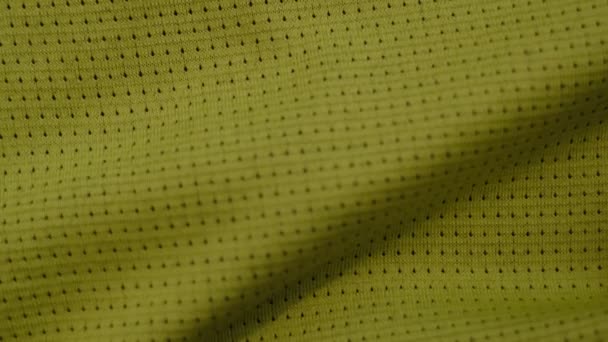 Macro-texturen van polyester. Groen polyester. Voering met schuim voor de binnenkant van een tas of kleding. groene speciale textiel gaas achtergrond. - Video