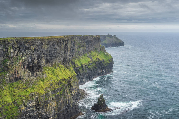 Dramatic storm clouds over iconic Cliffs of Moher, Ireland - Fotoğraf, Görsel