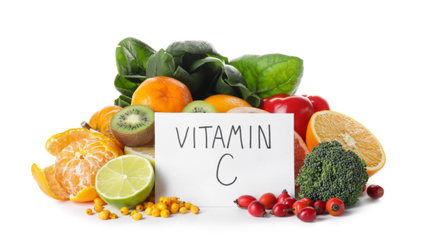Text VITAMIN C and healthy products on white background - Foto, Imagem