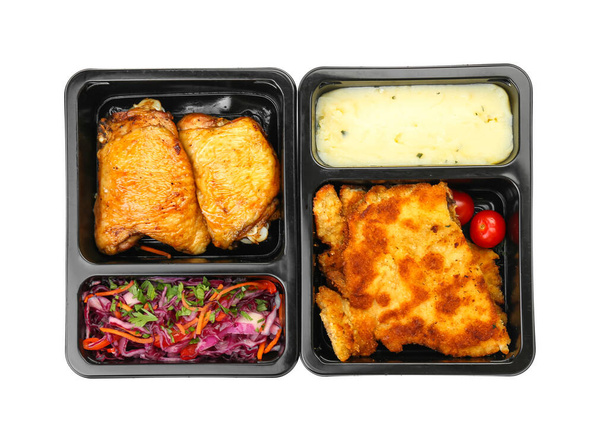 Смачна їжа в обідніх коробках на білому тлі
 - Фото, зображення