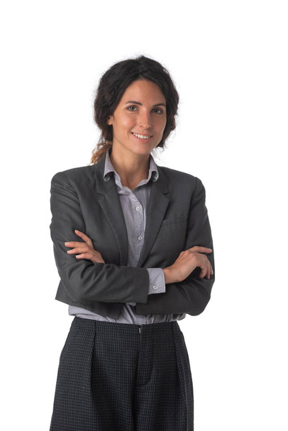 Smiling business woman with arms crossed, isolated on white background. - Photo, image