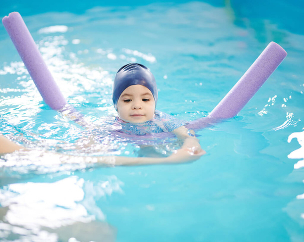 Kid swimming activity theme. Lessons for baby swim - Photo, Image