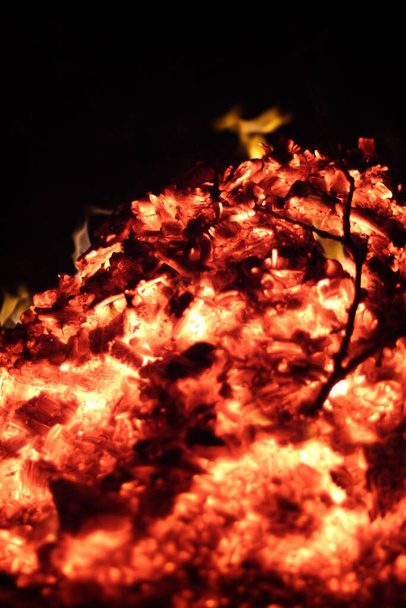 Fire. A flame on a black background. A background for designers. Colors of hell. Abstract fiery texture. - Foto, imagen