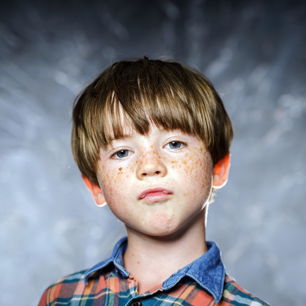 Emotional portrait of red-haired boy - Foto, Imagem
