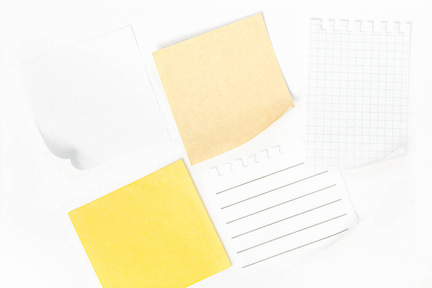 white and yellow sheets of paper on a white background - Photo, image