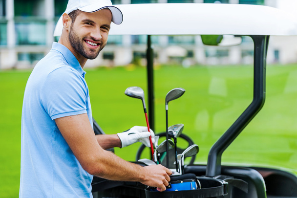 Golfer choosing driver - Fotó, kép