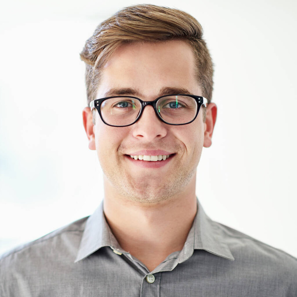 I determine my future. Cropped portrait of a young businessman wearing glasses. - Foto, imagen