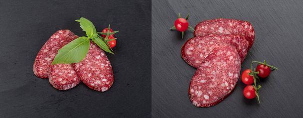 Raw smoked sausage with fresh herbs isolated on a black background - Photo, Image