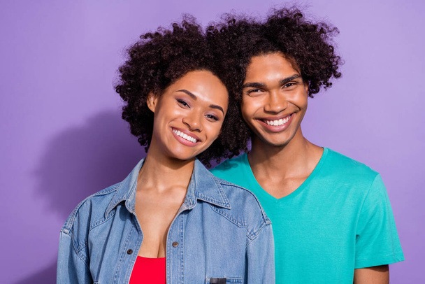 Photo of happy positive dark skin couple wear casual outfit harmony trust isolated on purple color background - Photo, Image