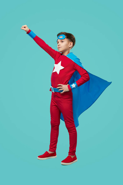 Brave superhero kid in studio - Фото, зображення