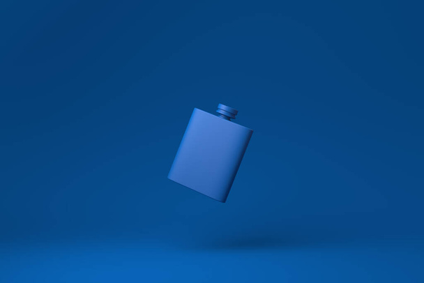Blue hipflask floating in blue background. minimal concept idea creative. monochrome. 3D render. - Photo, Image