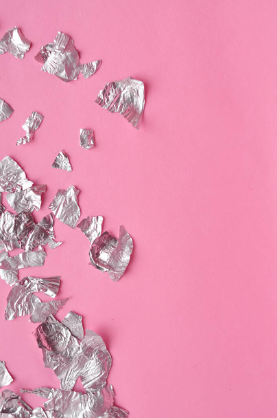 Sheets of steel foil on pink background copy space. High quality photo - Valokuva, kuva