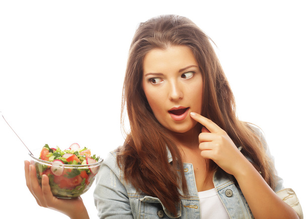donna felice mangiare insalata - Foto, immagini