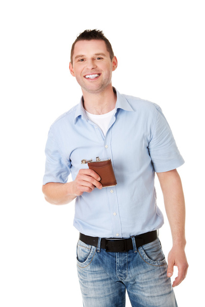 Confident man with hip flask - Photo, Image