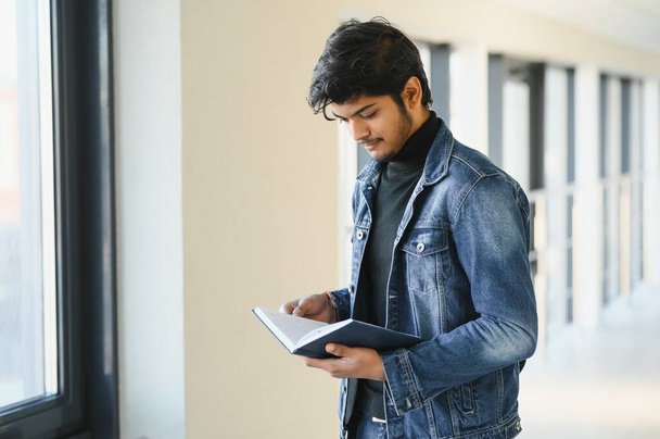 Happy indian male student at the university - Foto, Bild