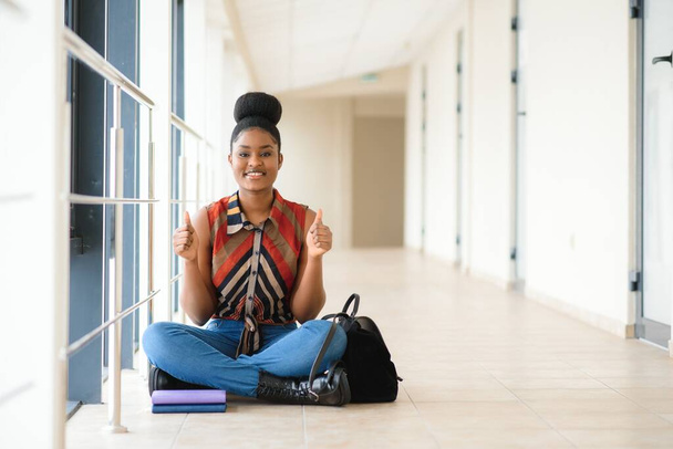 portrait of happy female african american college student - Photo, image