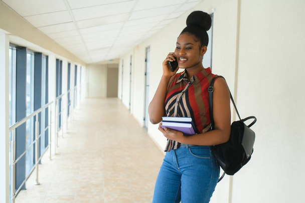 portrait of happy female african american college student - Photo, image