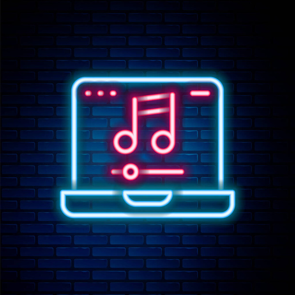 Glowing neon line Laptop with music note symbol on screen icon isolated on brick wall background. Colorful outline concept. Vector - Vektor, obrázek