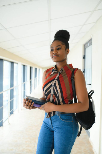 portrait of happy female african american college student - Foto, imagen